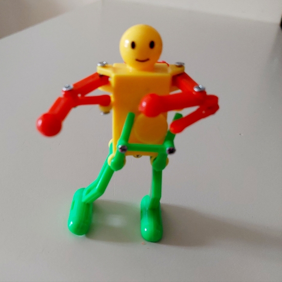 3.5" Fun Wind-up Dancing Walking Robot Toy Red Green and Yellow. Makes a great - Picture 6 of 11